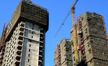 IMAGINECHINA New high-rise residential apartment buildings under construction in Lianyungang, Jiangsu province, Nov. 18, 2013.