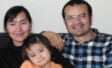 Abduweli Ayup (R) with his wife and daughter while studying in the U.S. in 2010. Photo courtesy of the family via RFA