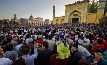 Uyghurs gathering in front of Idkah Mosque in Kashgar, East Turkestan. Photo: World Policy Blog